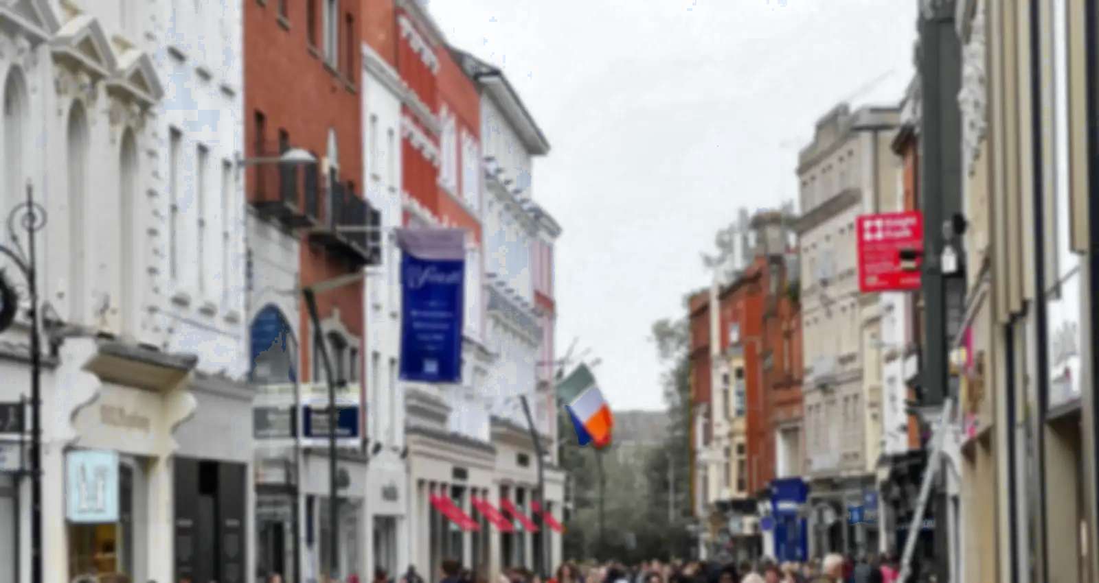 Busy Dublin shopping street, blurred (illustrative image)